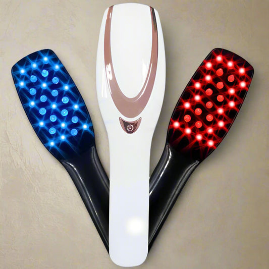 Phototherapy comb with blue and red LED lights on a white background